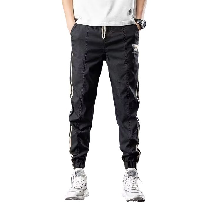 Pantalones de herramientas para hombres, modelos de primavera y otoño, moda de marca de moda, otoño delgado, pies sueltos, pantalones vaqueros de talla grande en forma de cono Harlan para hombres