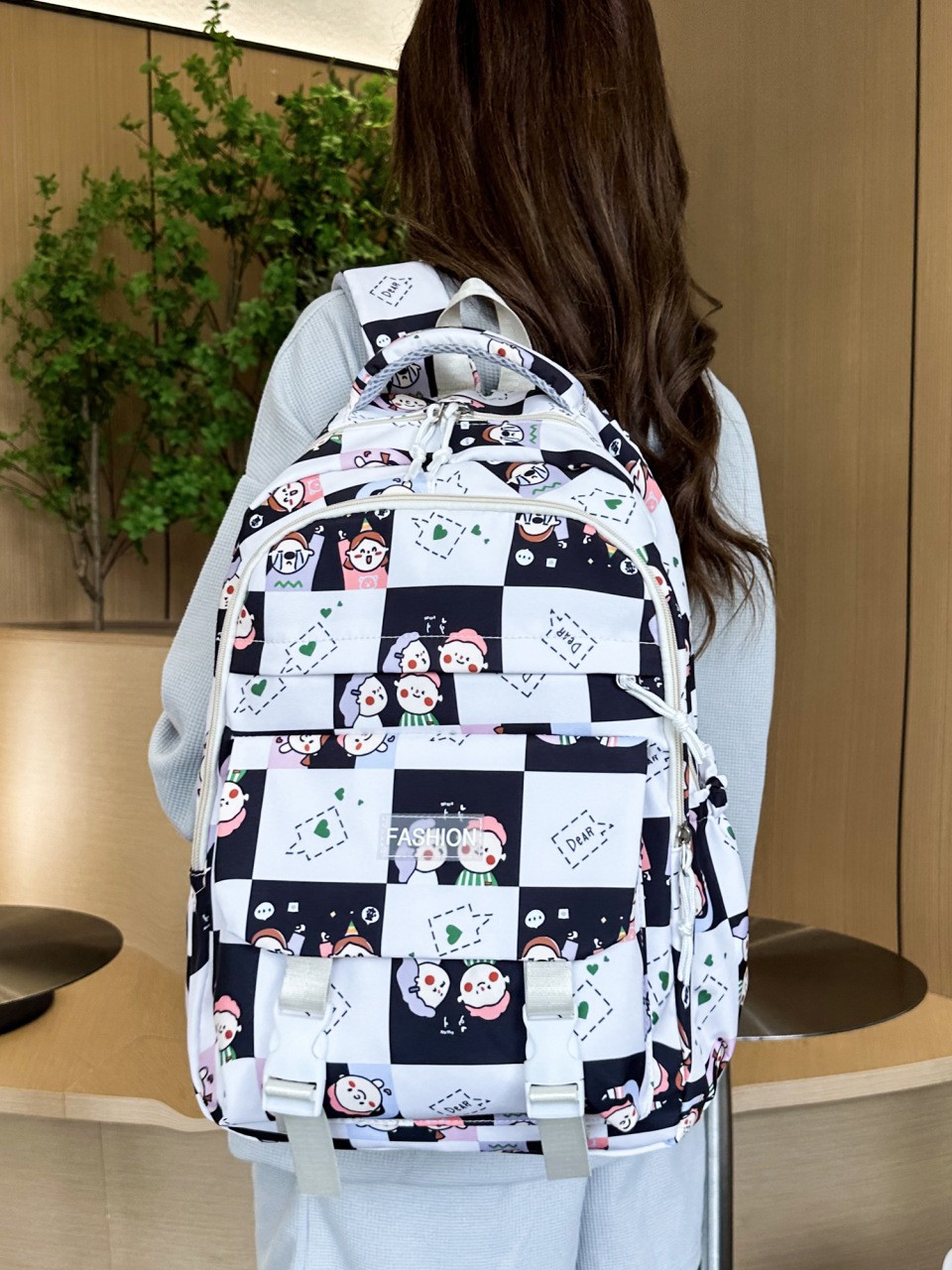 Estudiantes de secundaria y secundaria, mochila de computadora de tendencia ligera, mochila coreana de viaje transfronterizo de gran capacidad.