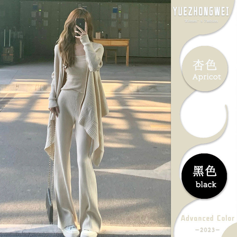 Autumn and winter atmosphere knitwear three-piece set: draped asymmetrical cardigan, slim-fit camisole, and slimming knitted flared long pants Autumn and winter atmosphere knitwear three-piece set: draped asymmetrical cardigan, slim-fit camisole, and slimming knitted flared long pants