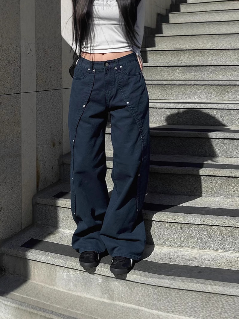 Estilo americano calle dulce y fresco diseño de remaches irregularmente sueltos jeans rectos moda femenina todo fósforo color sólido casual
