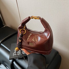 レトロハイエンドニッチハンドバッグレディース2025夏人気多用途餃子バッグカジュアルショルダークロスボディバッグ