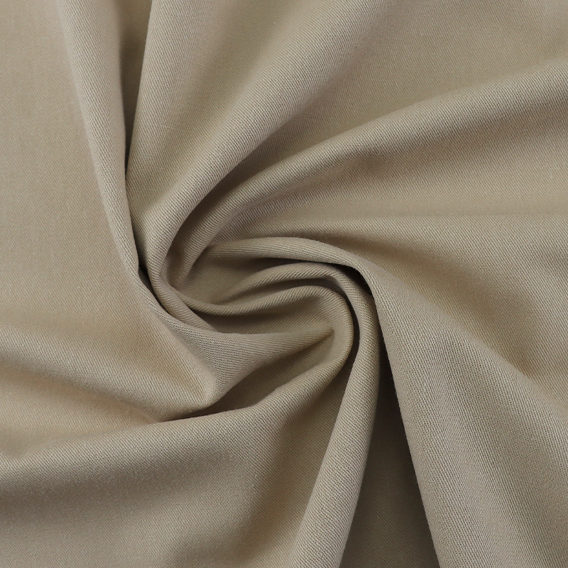 Algodón engrosado de alta densidad sarga lavada tela algodón fabricante en stock primavera y verano casual suspender pantalones overoles chaqueta tela