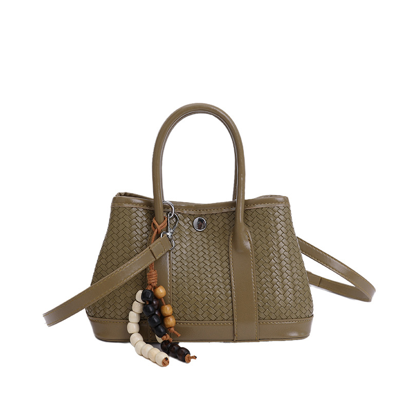 Bolsa de mano de alto nivel transfronterizo trenzada bolsa de cubo de agua para mujeres otoño y invierno 2025 nuevo estilo extranjero bolso de hombro bolso de mochila versátil