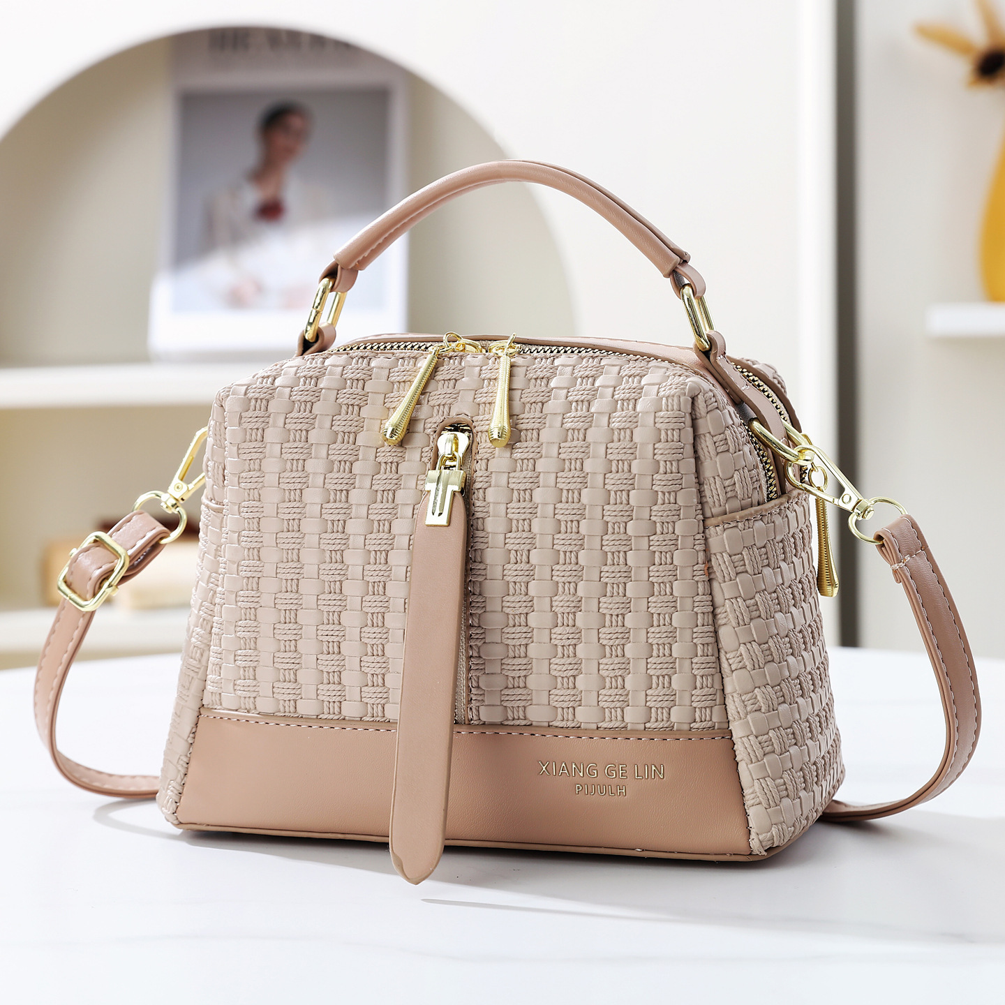 2026 nuevo temperamento de moda tejido bolso de mano textura casual mochila de hombro de gran capacidad bolso de viaje
