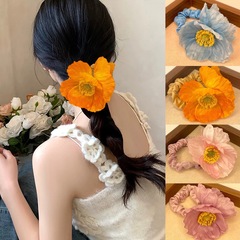 新商品のコクリコ美人の花の大腸の髪輪は布芸の高級感をシミュレーションします。