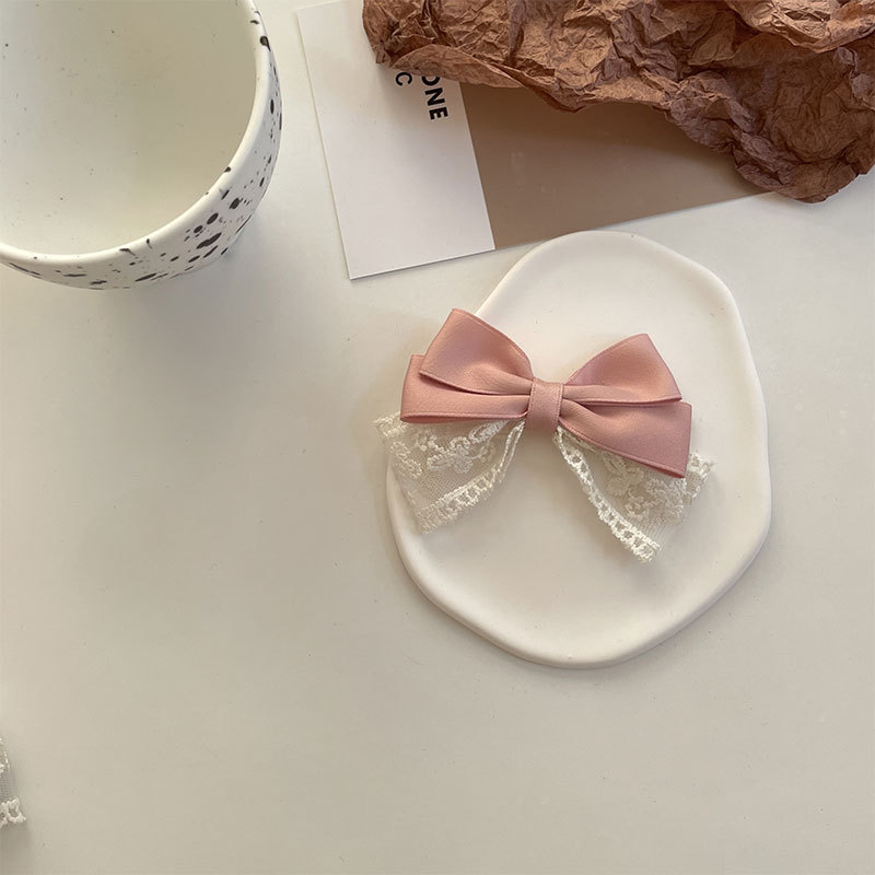 Women's Sweet Simple Style Bow Knot Cloth Hair Clip Hair Tie Brooches display picture 9