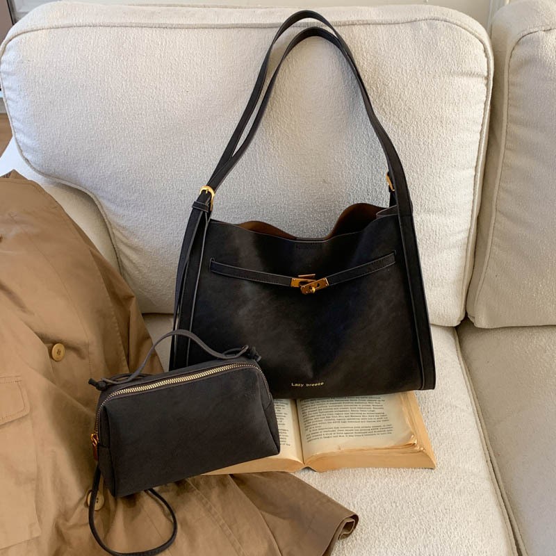 Temperamento de moda de color sólido ocio retro ventas calientes nuevas bolsas de mano de mujer de gran capacidad de viaje de hombro bolsas de tendencia