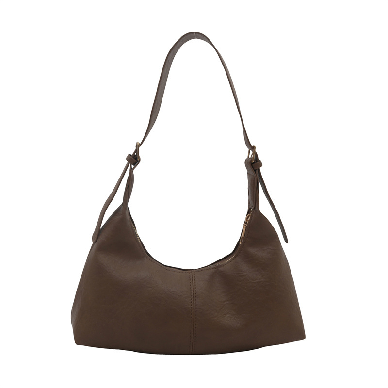 Bolsa coreana de seda texturizada 2024, nuevo nicho de diseño, bolso de palo, bolso de hombro retro de cuero pu.