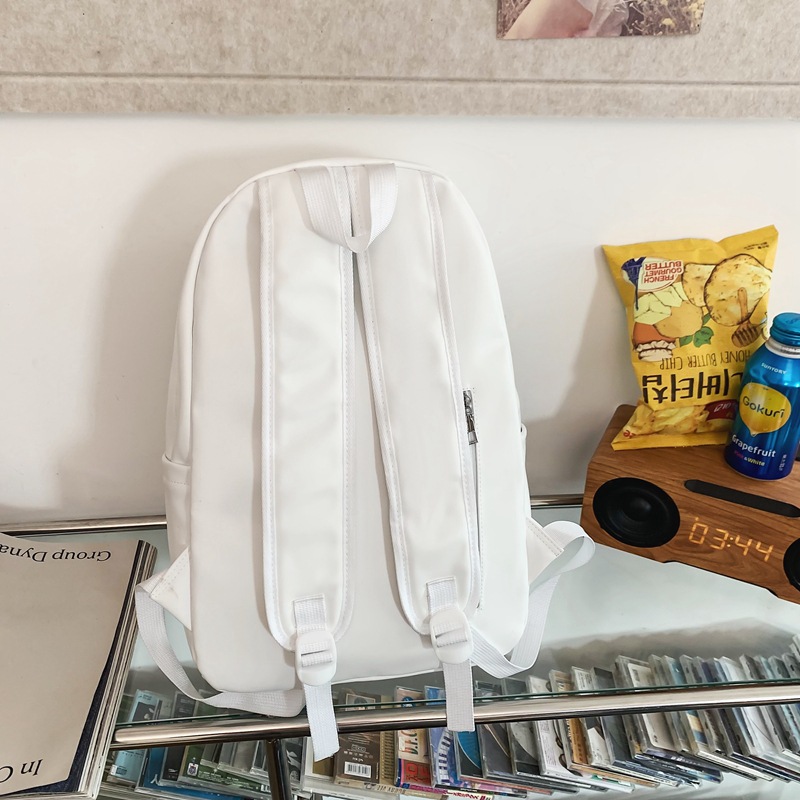 2023 invierno nueva mochila de pareja de gran capacidad simple y versátil mochila de computadora de viaje de cuero suave mochila escolar al por mayor