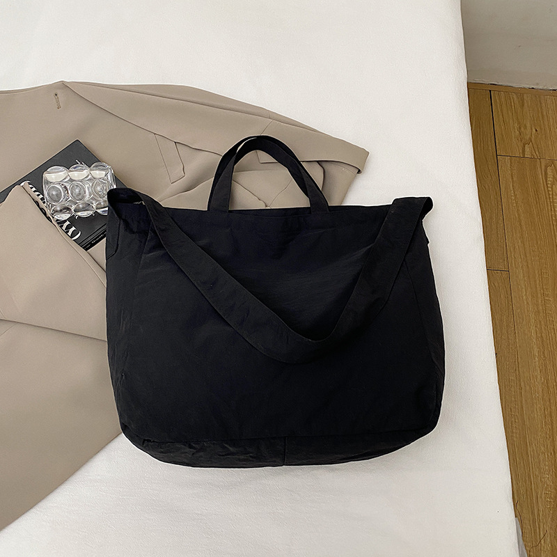 Simple relajado sensación de gran capacidad bolso de lona de hombro de mujer hollow viento versátil bolso de mochila