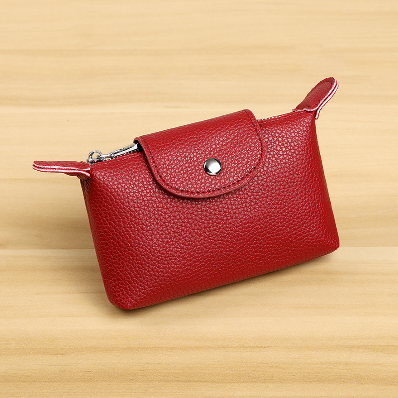 Nuevo bolso de cambio de cuero de moda para mujeres, bolso de llaves con cremallera, bolso de monedas portátil, retro y pequeño.