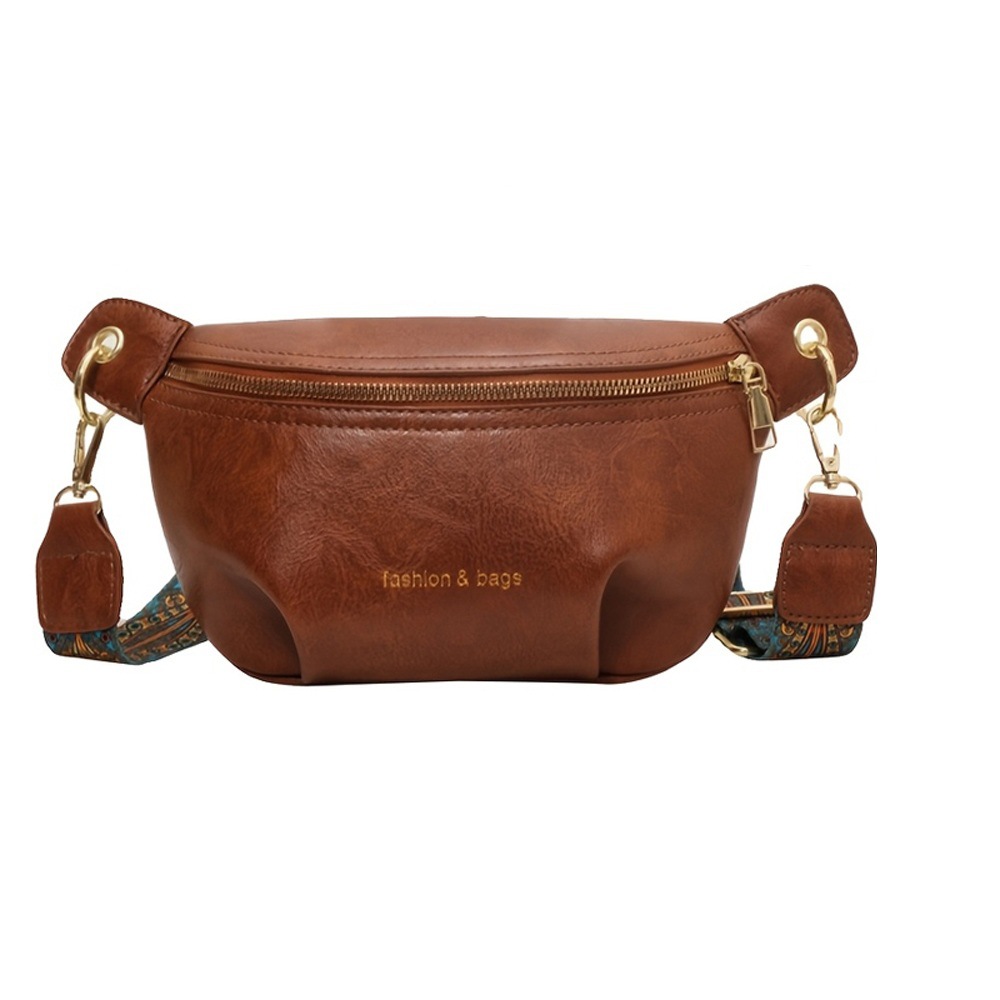 Bolso de diseño de nicho para mujeres versátil 2025, nuevo bolso de hombro de banda ancha para mujeres, bolso de pecho, bolso de cintura.