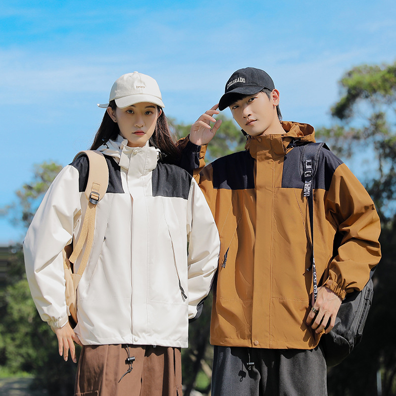 Primavera y otoño deportes al aire libre pareja de moda casual sombrero desmontable color a juego hombres y mujeres chaqueta delgada entrega en vivo