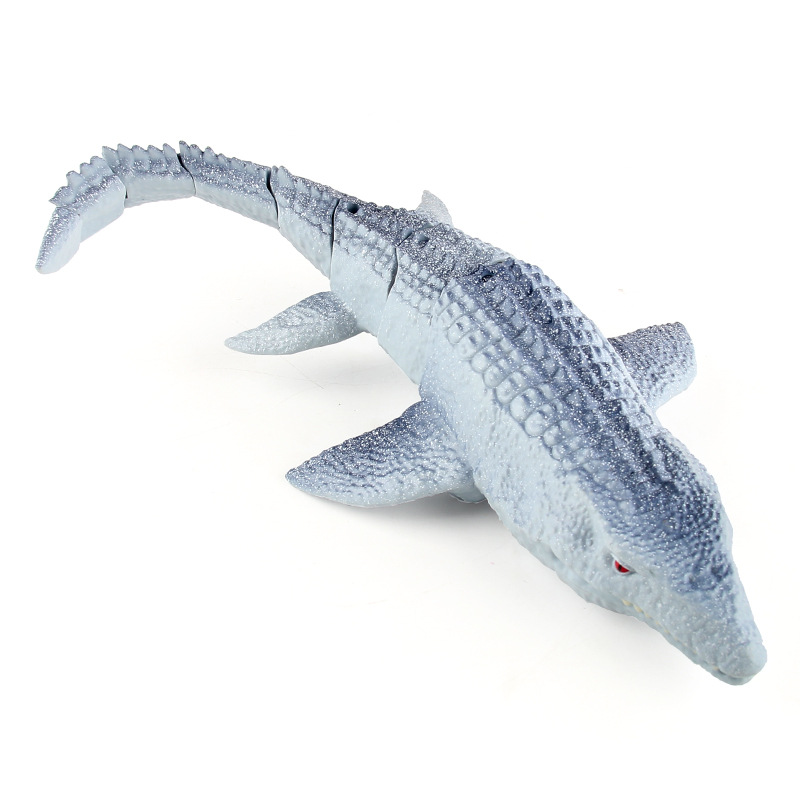 Cruzar la frontera nuevo 2,4g de control remoto de natación agua dragón rompecabezas eléctrico caminar dinosaurio niños dinosaurio modelo de juguete al por mayor