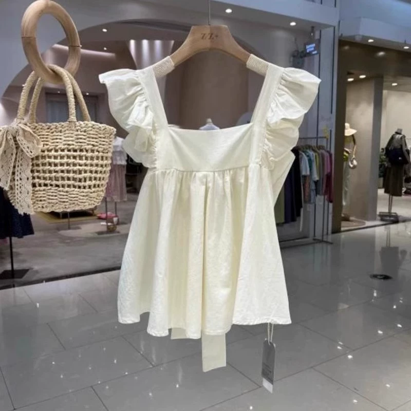 Шикарный дизайн с открытой спиной и бретельками, новая рубашка с милым летним бантом, квадратный воротник, летящие рукава, уменьшающие возраст, топ для похудения.