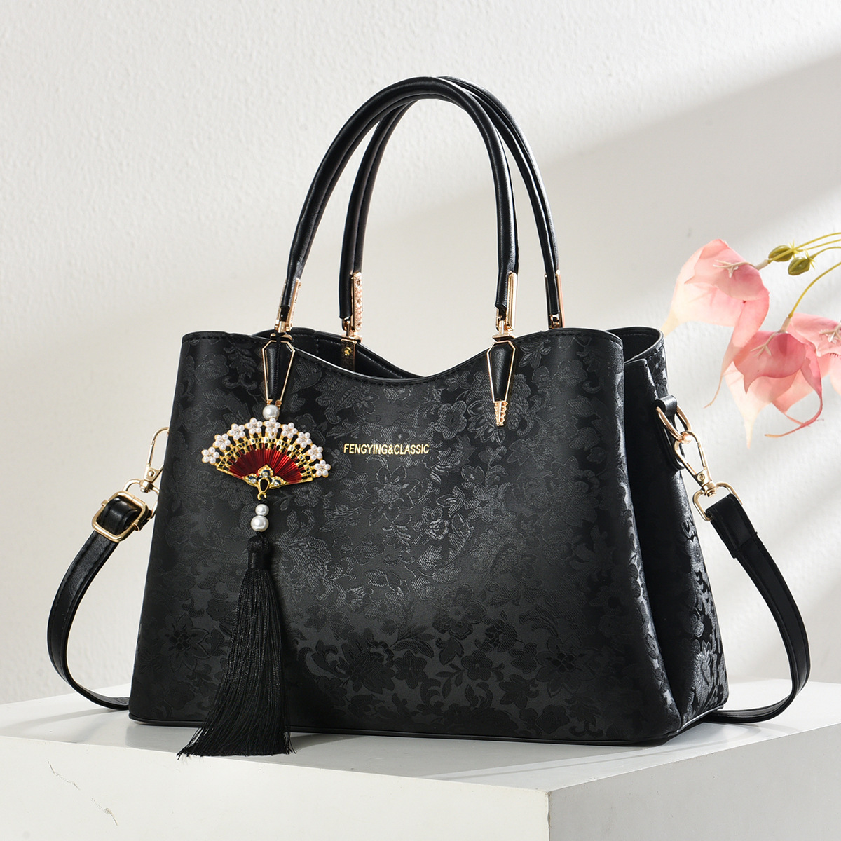 Bolso de mujer Regalo del día de la madre Bolso de madre estampado de moda caliente 2025 nuevo bolso de hombro de viajero de estilo nacional