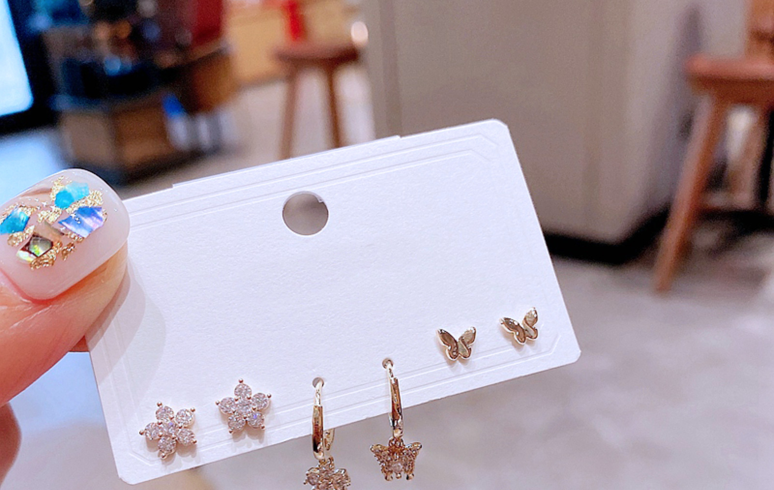 Fashion Inlaid Zircon Flower Butterfly Copper Earrings Three Pairs Wholesale display picture 2