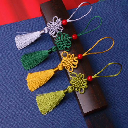 Chinese knot tassel six-plate Fangsheng knot pierced with red beads and tassels U disk sachet bookmark pendant small Chinese knot wholesale