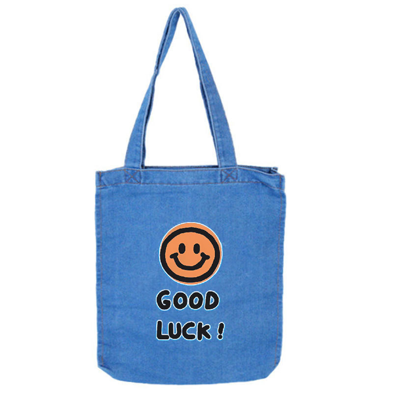 Venta al por mayor de bolsos de hombro único versión coreana de bolsos de lona impresos con letras simples de estilo literario y artístico bolsos de lona de moda y respetuosos con el medio ambiente bolsos de lona portátiles