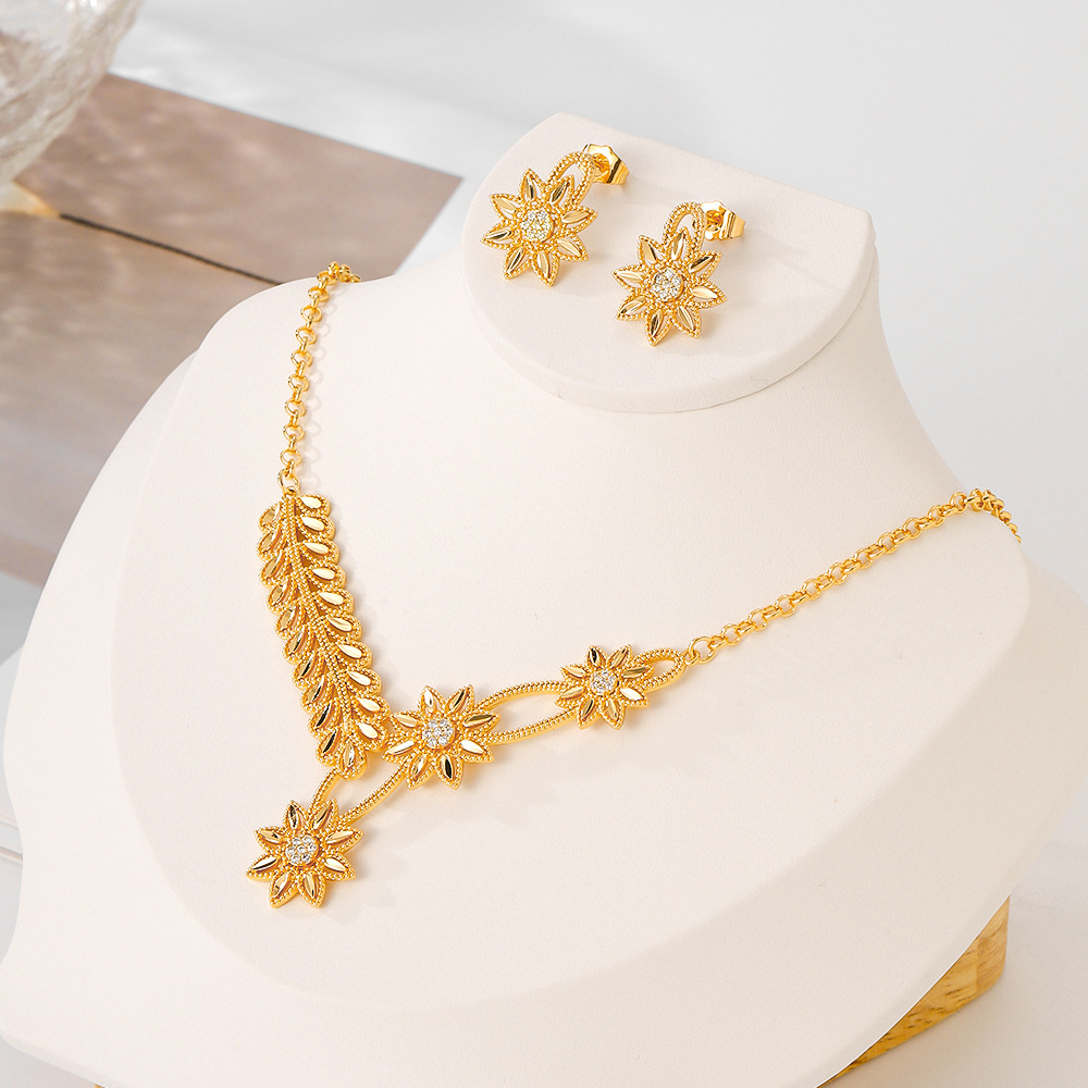 Joyería de moda europea y americana para mujeres aretes de bronce de piedra de aluminio collar de dos piezas juegos de joyería de moda transfronteriza en el Medio Oriente