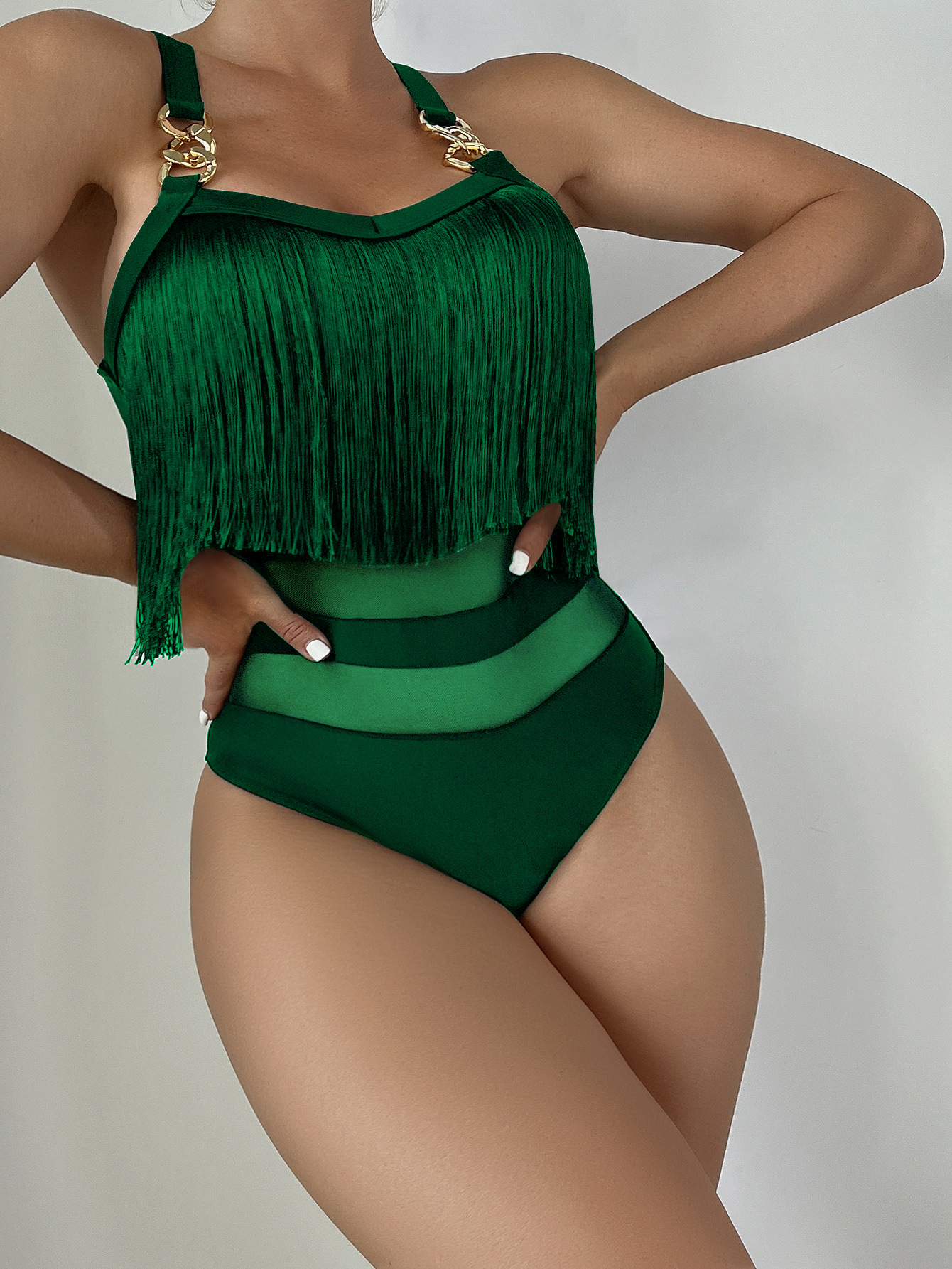 2025 Nuevo traje de baño hueco con tirantes y borlas europeas y americanas, traje de baño de una pieza con cadena Multicolor, Bikini femenino de realce