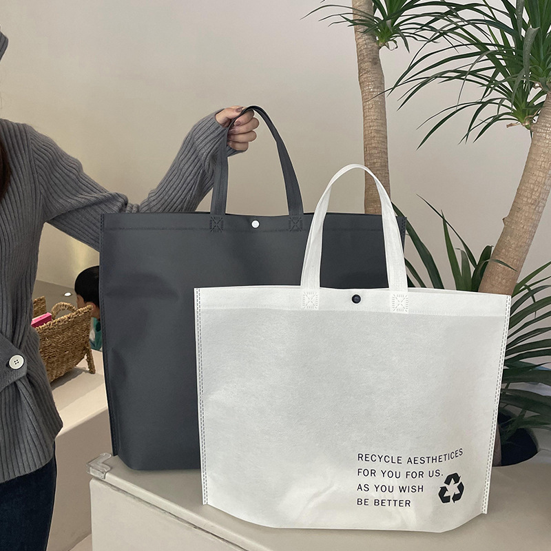 Environmental protection non-woven clothing store handbag women's commercial thickened bag packaging wholesale shopping packing belt wholesale
