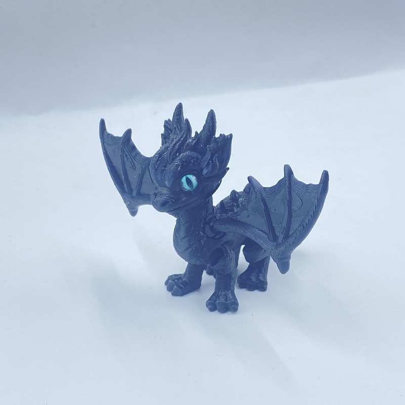 3Dプリントされたかわいい西洋のドラゴンの羽と尾は縮めたり動かしたりできる関節が付いており、子供向けのギフト、おもちゃ、モデルの装飾品です。|undefined