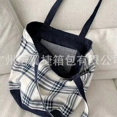 デニムの格子は両面のリュックサックで韓国系の簡単な学院の百合の大容量の通勤バッグです。