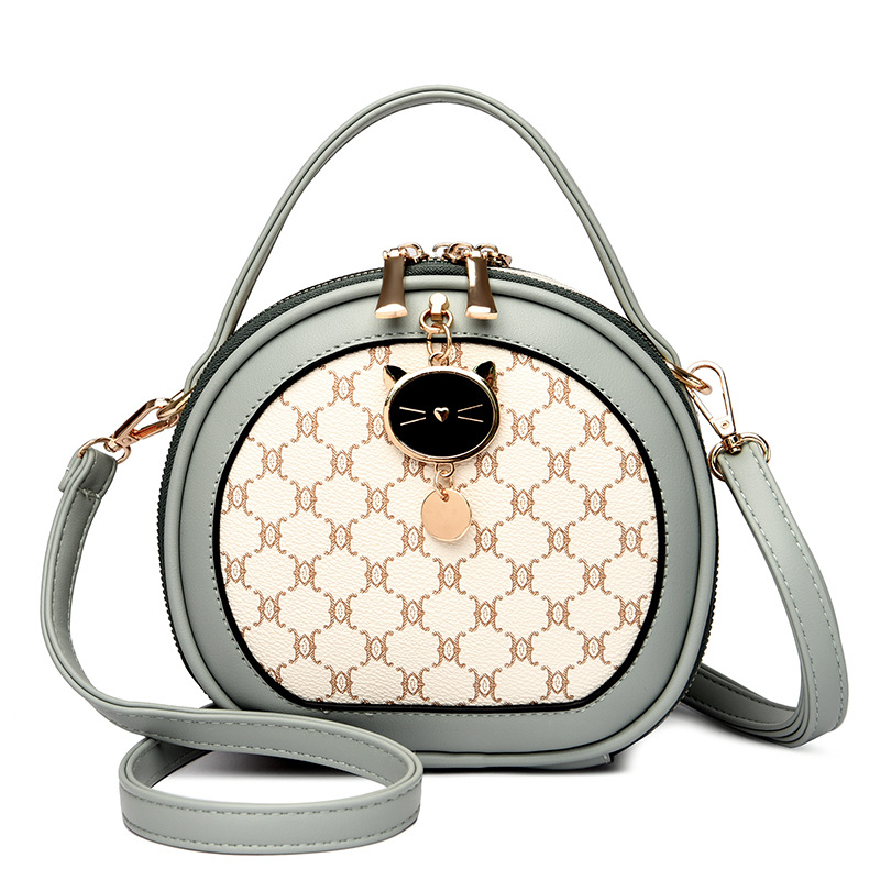 La nueva bolsa redonda impresa a mano de primavera 2023 tiene una piel suave de 98.501 hombros.