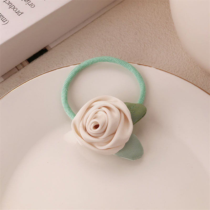 Historia de rosa amarilla coreana flor anillo de cabello cuerda de cabeza de alta sensación suave dulce camellia cuerda de cabello correa tocado