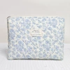 Blue flower on white background-medium size