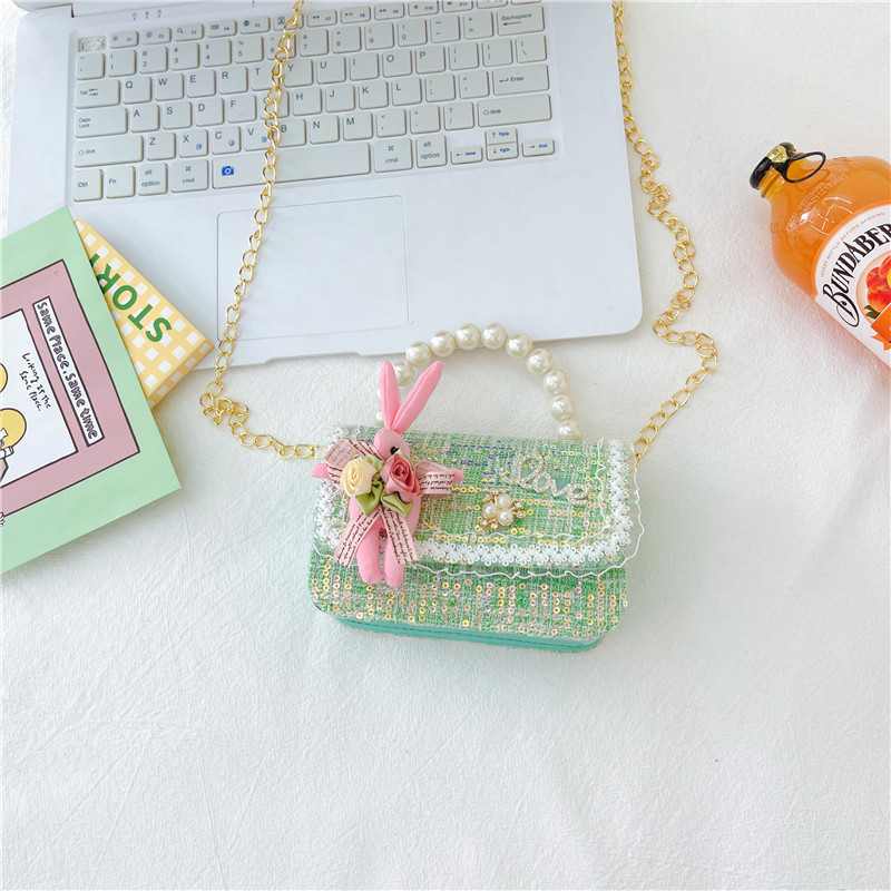 Estilo coreano de los niños bolsa pequeña de Kindergarten niñas mini bolso 2023 nueva cadena de conejito de dibujos animados bolsa de hombro