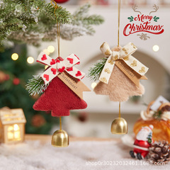クリスマスの飾りの鈴のペンダントの蝶結びのフェルトのクリスマスツリーのドアの飾りの風鈴の雰囲気の配置