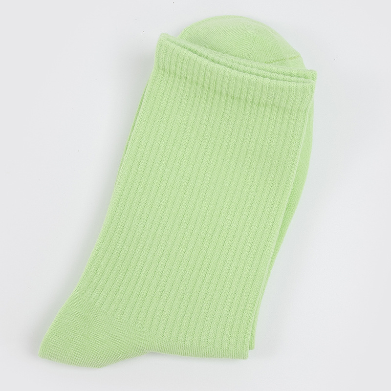 Calcetines de mujer para primavera y otoño, calcetines de algodón de color liso, versátiles y a la moda, calcetines holgados, calcetines de longitud media, calcetines deportivos que absorben el sudor, venta al por mayor.