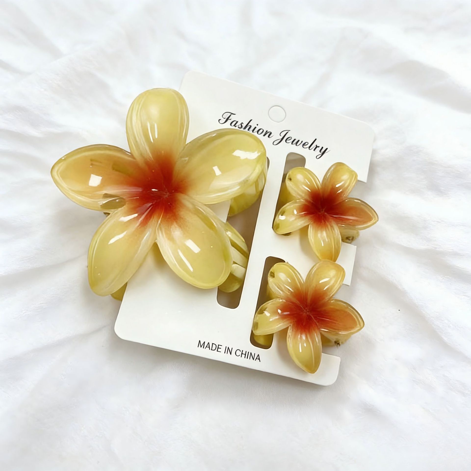Ventas transfronterizas calientes nuevos huevos láser de dos colores clip de agarramiento de flores de cabeza posterior clip de tiburón clip de cabello joyerías para el cabello