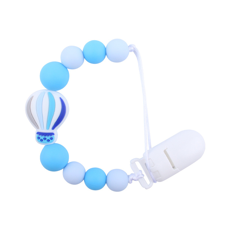 Nuevo bebé suministros chupete cadena creativa dibujos animados globo de aire caliente de silicona mordedura cadena anti-gota molar
