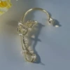 Golden ear clips with zircon pearl