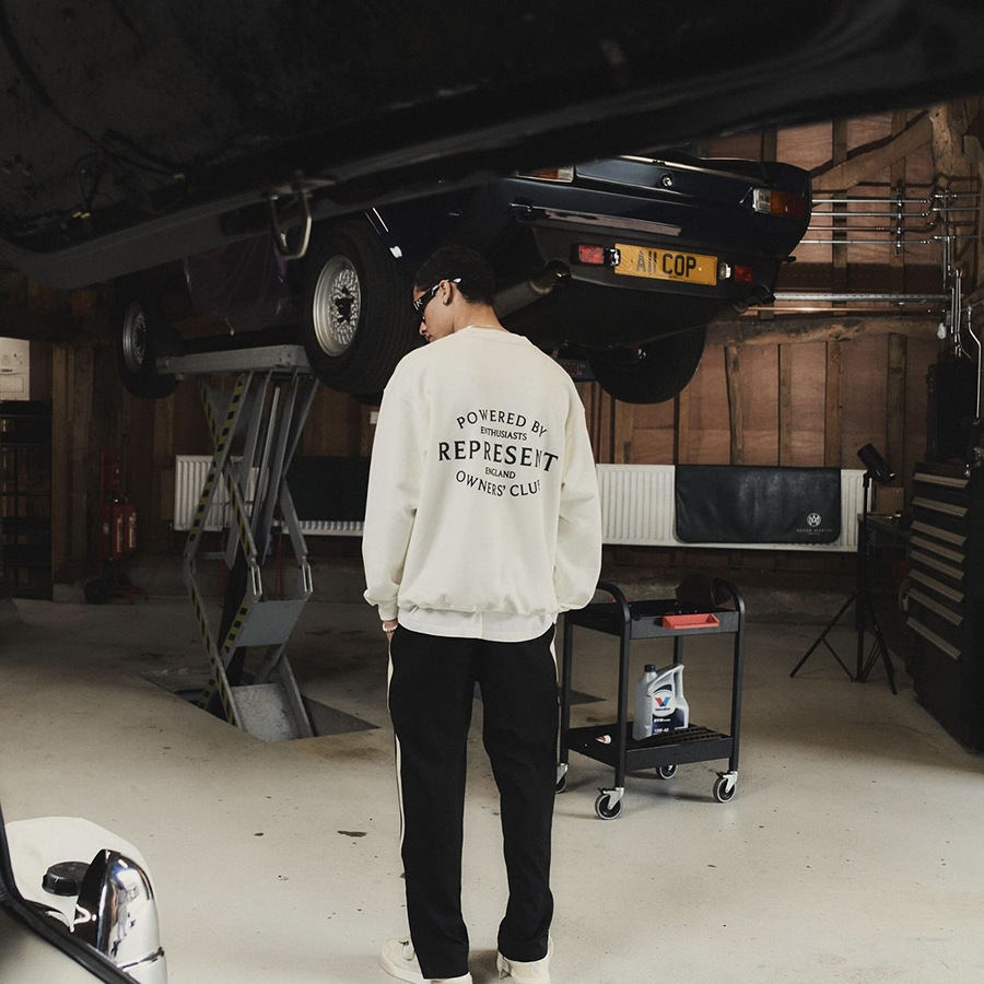 Represent logotipo del club sello impresión transfronteriza nuevo estilo americano de calle alta hombre suelta sudadera con capuz