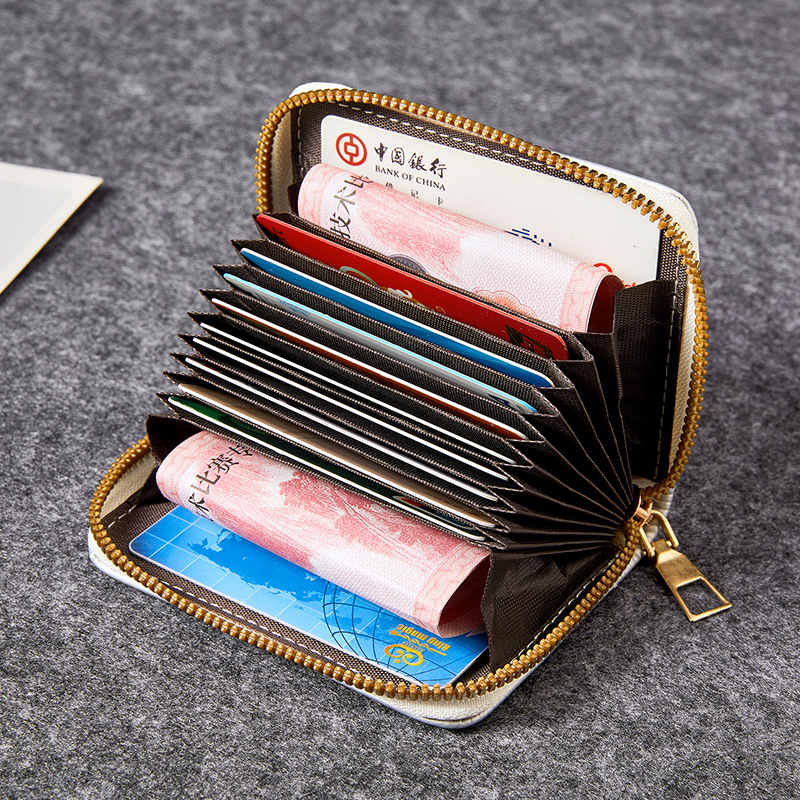 Monedero corrugado de agua corto para mujer transfronteriza japonesa 2024 billetera pequeña con cremallera bolso de mano corto bolso de moneda