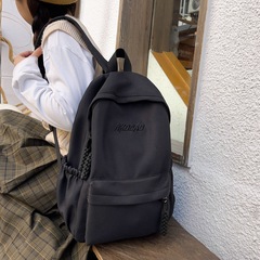 背包女高級感輕旅遊大容量簡約純色雙肩包女校園初中大學生書包