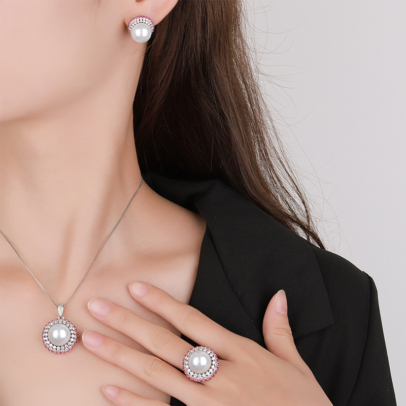 Zhuang Sheng joyería fondo de cobre chapado en oro simulación color tesoro con incrustaciones de color blanco perla salto de tres piezas traje femenino 14-12mm