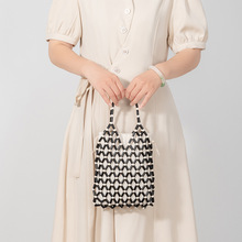 跨境沙滩度假手提包手工编织包包女海边小众设计木珠包女加工定制