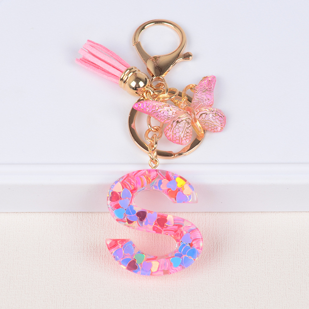 Explosiones transfronterizas amor sequillas iniciales llavero al por mayor resina letra mariposa fringe llavero se puede personalizar