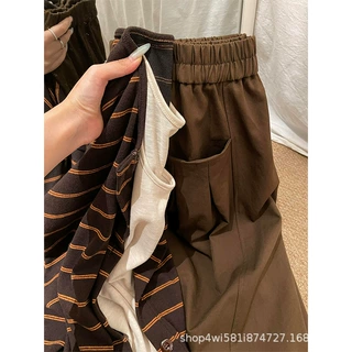 美拉德咖色弯刀裤女秋季2026新款设计感小众独特慵懒风宽松阔腿裤