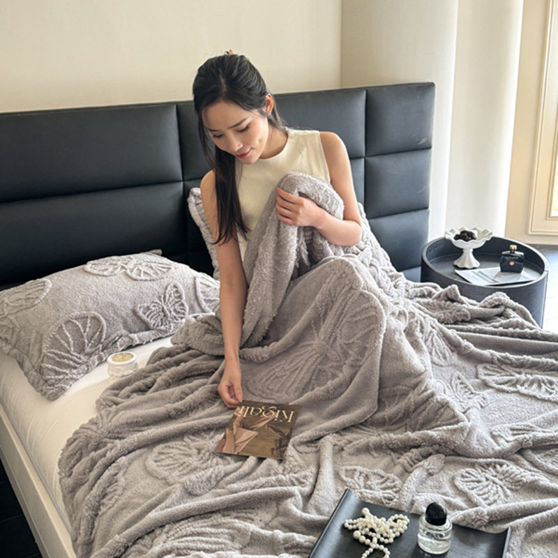 Torre de viento de lujo ligero transfronterizo Fufu terciopelo color sólido jacquard multifunción manta manta manta de sofá de mariposa jacquard de una sola capa manta al por mayor