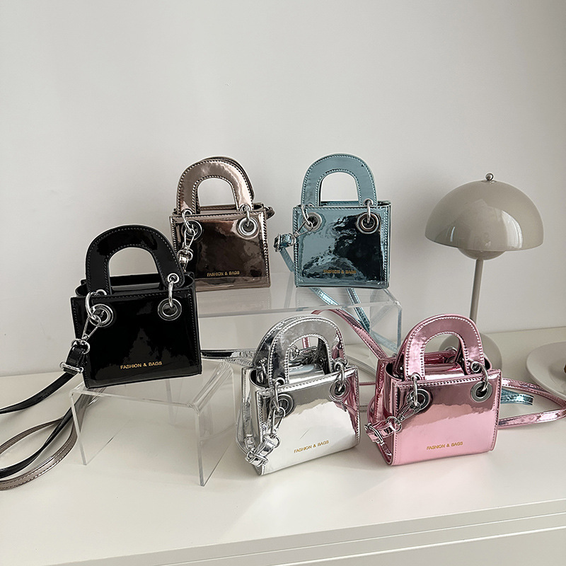 Jardín de infantes nuevo bolso de mochila de estilo esmaltado, bolso cuadrado para niños y niñas, bolso de color sólido para niños