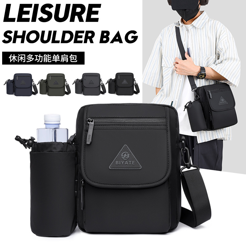 男士包牛津布单肩包2024新款跨境商务通勤防水竖款小包斜挎包男包