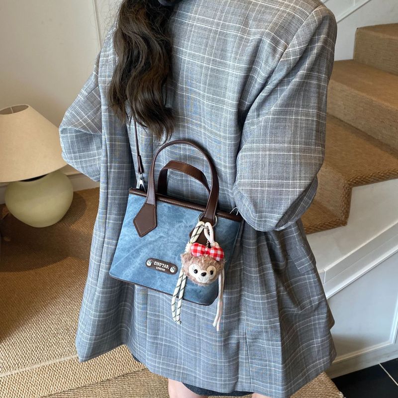 韩版小众手提水桶包女2025秋季新款时尚撞色单肩包复古通勤斜挎包|undefined