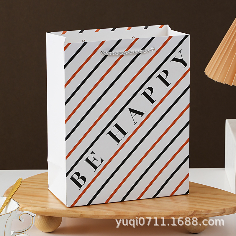 Bolsa de mano simple de alta calidad, embalaje de ropa de alta gama, bolsas de regalo, bolsas de cartón blanco, logotipo de impresión directa