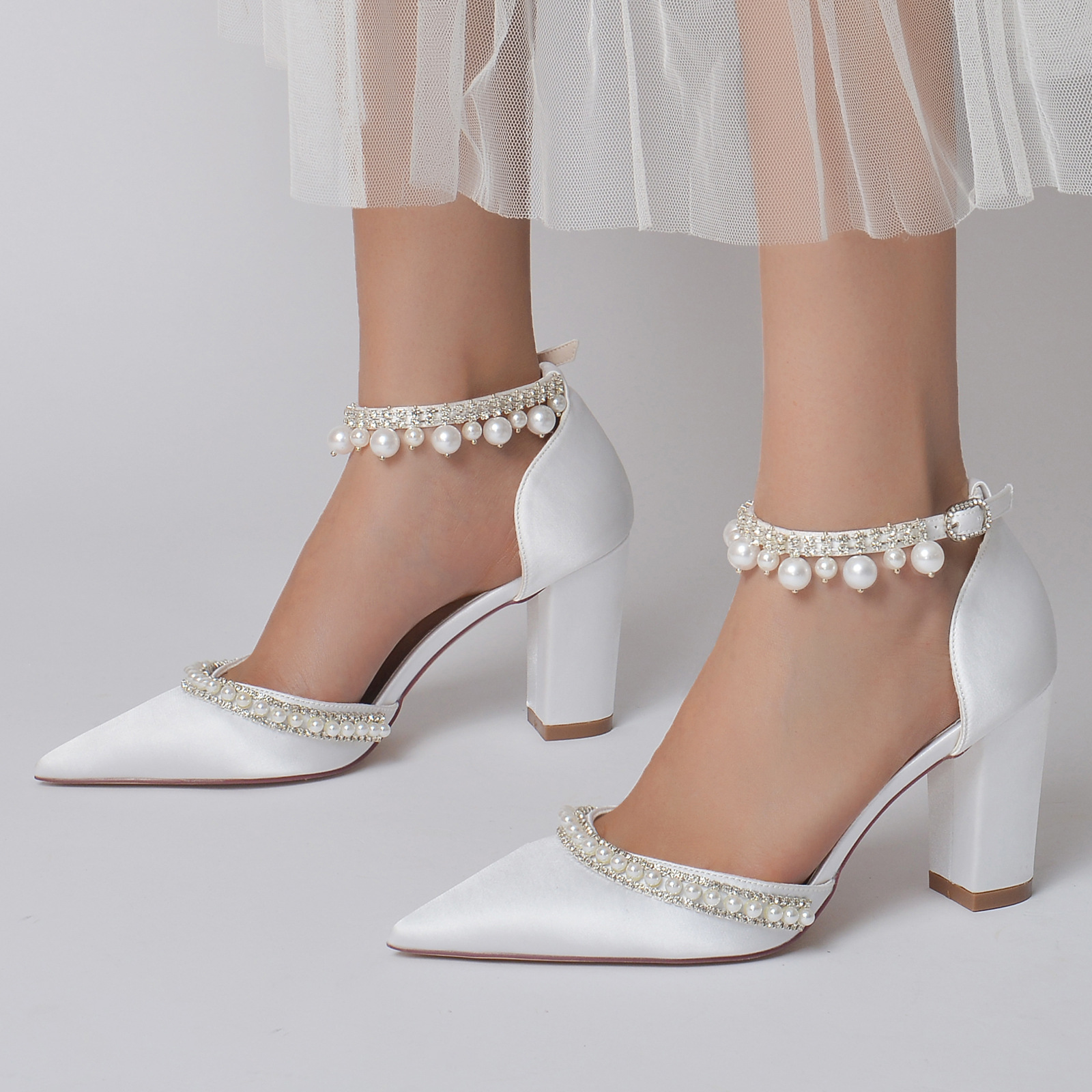 Thick heel pointed toe pearl rhinestone...